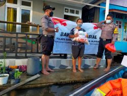 Peran Aktif Polsek Tayan Hilir dalam Upaya Penanggulangan Banjir