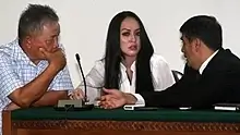 Keterangan foto: Angelina Sondakh duduk di kursi terdakwa dalam persidangan. (Wikipedia/Istimewa)