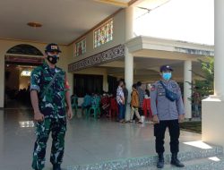 Babinsa Menyuke Laksanakan Pengamanan Misa Minggu Palma